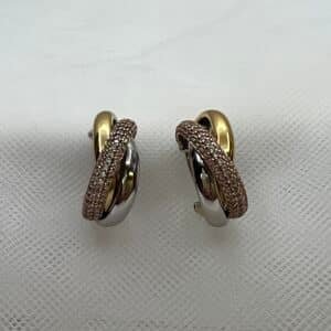 Pendientes de plata tricolor de aros entrelazados con circonitas