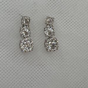 Pendientes de rosetones de circonitas rodiados en oro blanco