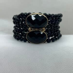 Pulsera de cinco vueltas elásticas con onix facetado chapada en oro amarillo