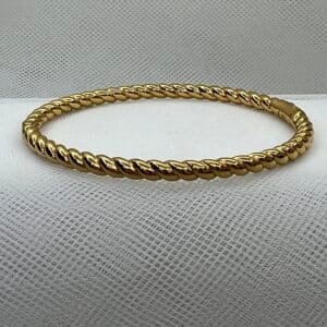 Esclava gallonada de plata chapada en oro amarillo.