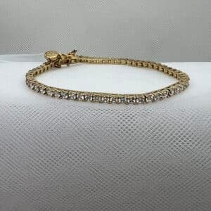 Pulsera de plata chapada en oro con circonitas