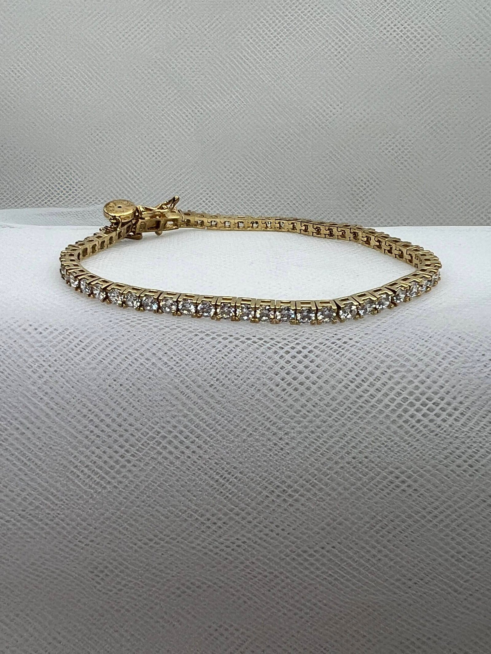 Pulsera de plata chapada en oro con circonitas