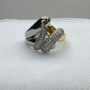 Anillo de plata bicolor oro amarillo y blanco chapado con circonitas.