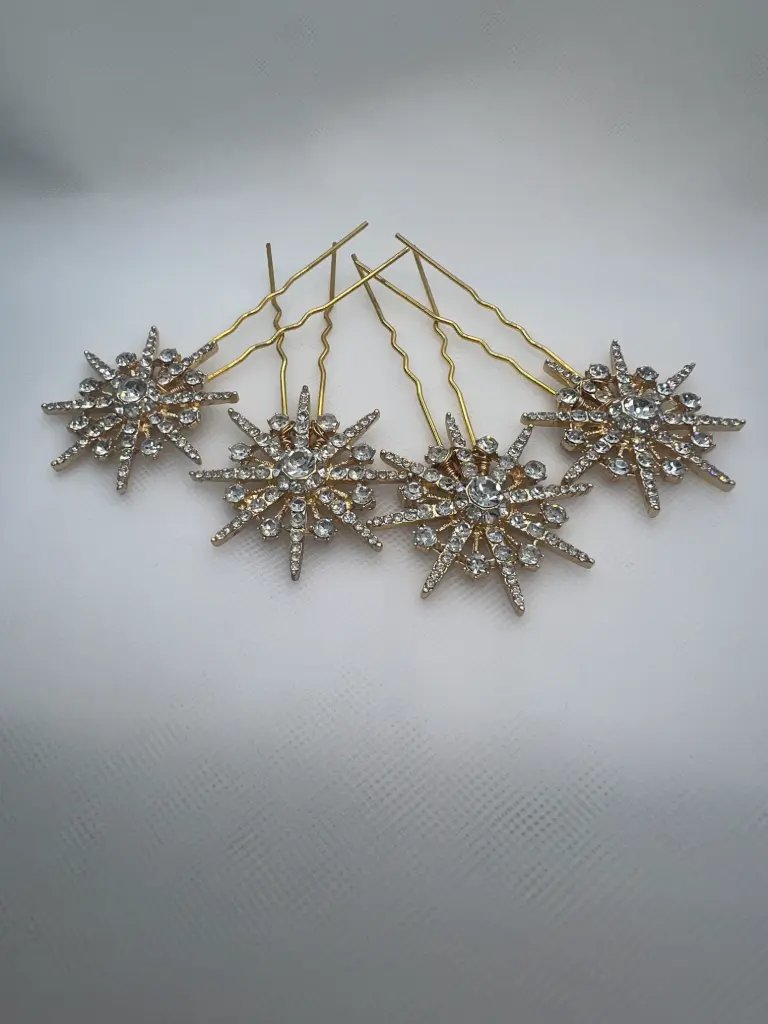 Tocado estrellas doradas con circonitas