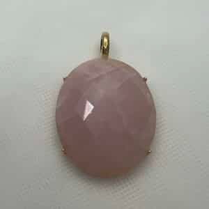Colgante de bronce chapado en oro de piedra natural cuarzo rosa facetado.