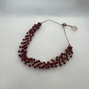 Pulsera de plata chapada rosa con piedras rojas