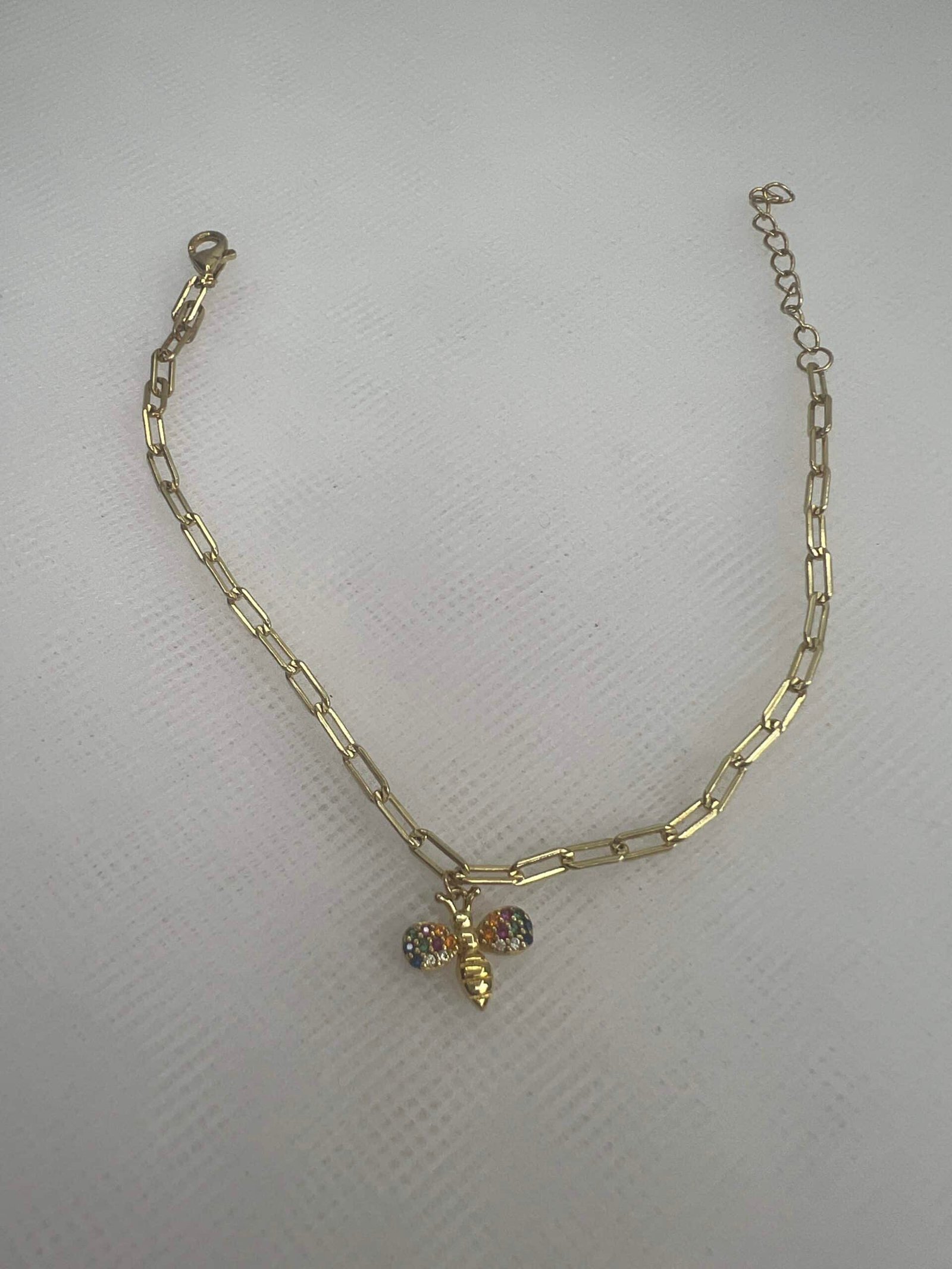 Pulsera de plata chapada en oro con colgante de circonitas