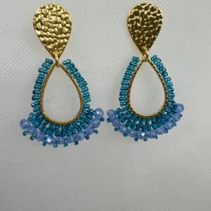 Pendientes largos de acero chapado azules.