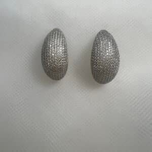 Pendientes de botones  alargados de pave con circonitas rodiados en oro blanco